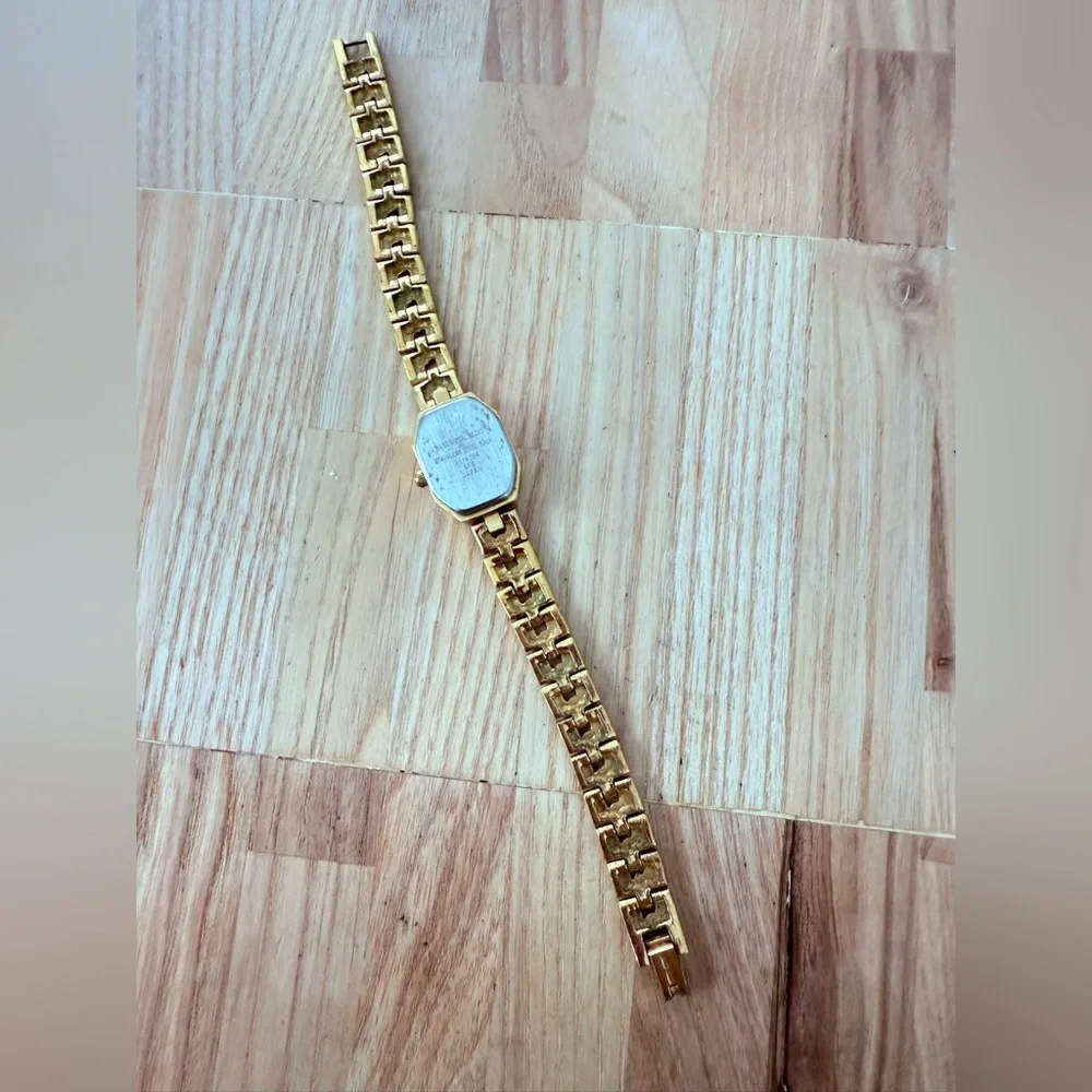 Armitron ladies octagonal gold tone diamond dress watch NEW BATTERY